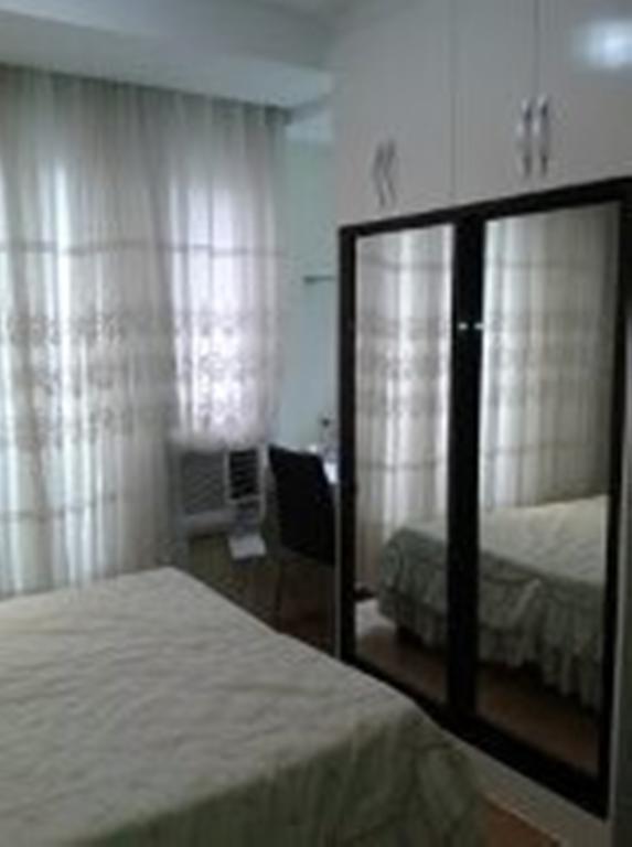 The Oasis Davao Condotel Room photo